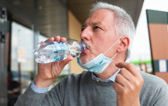 Man Drinking Water